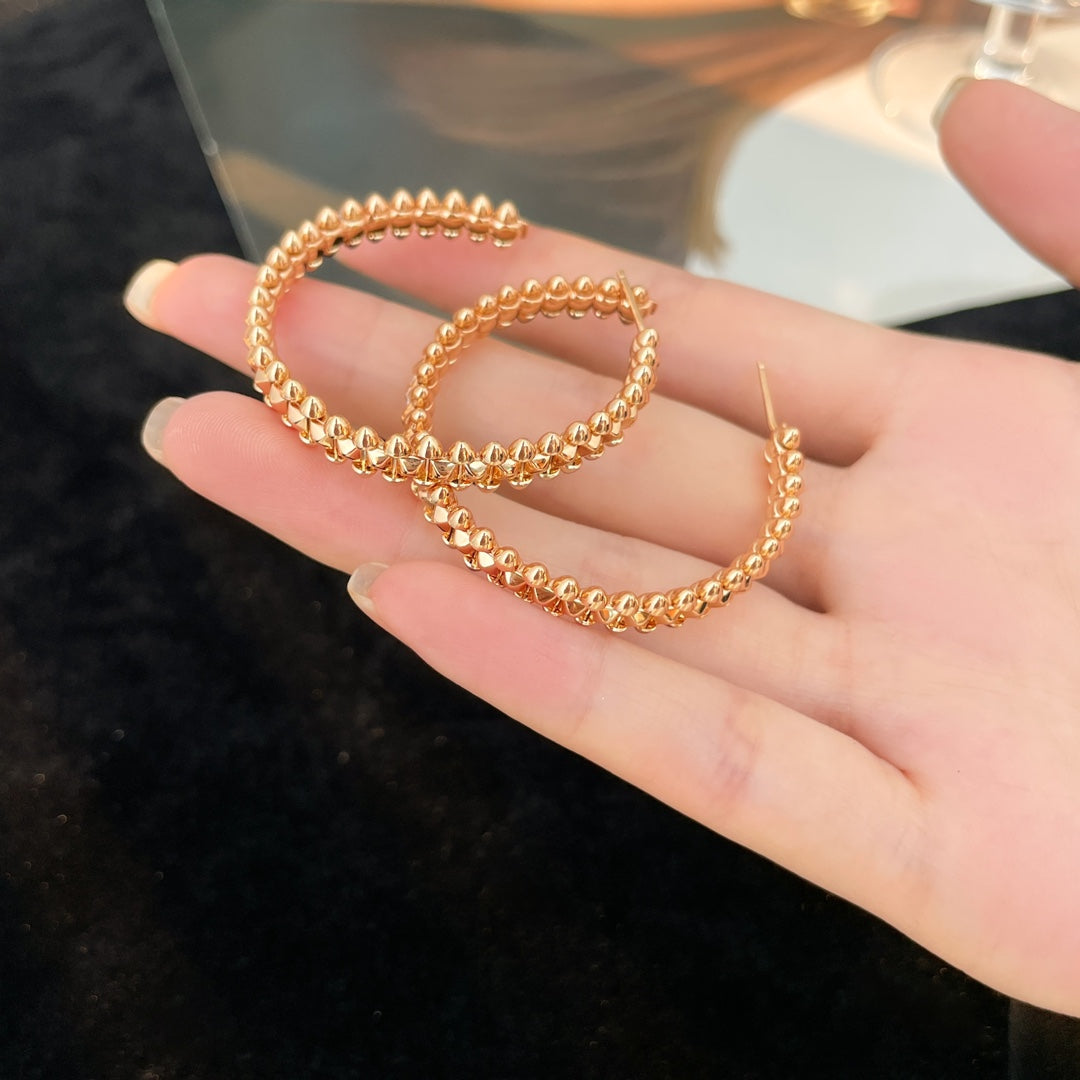 CARTIER CLASH HOOP EARRINGS
