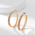 CARTIER CLASH HOOP EARRINGS
