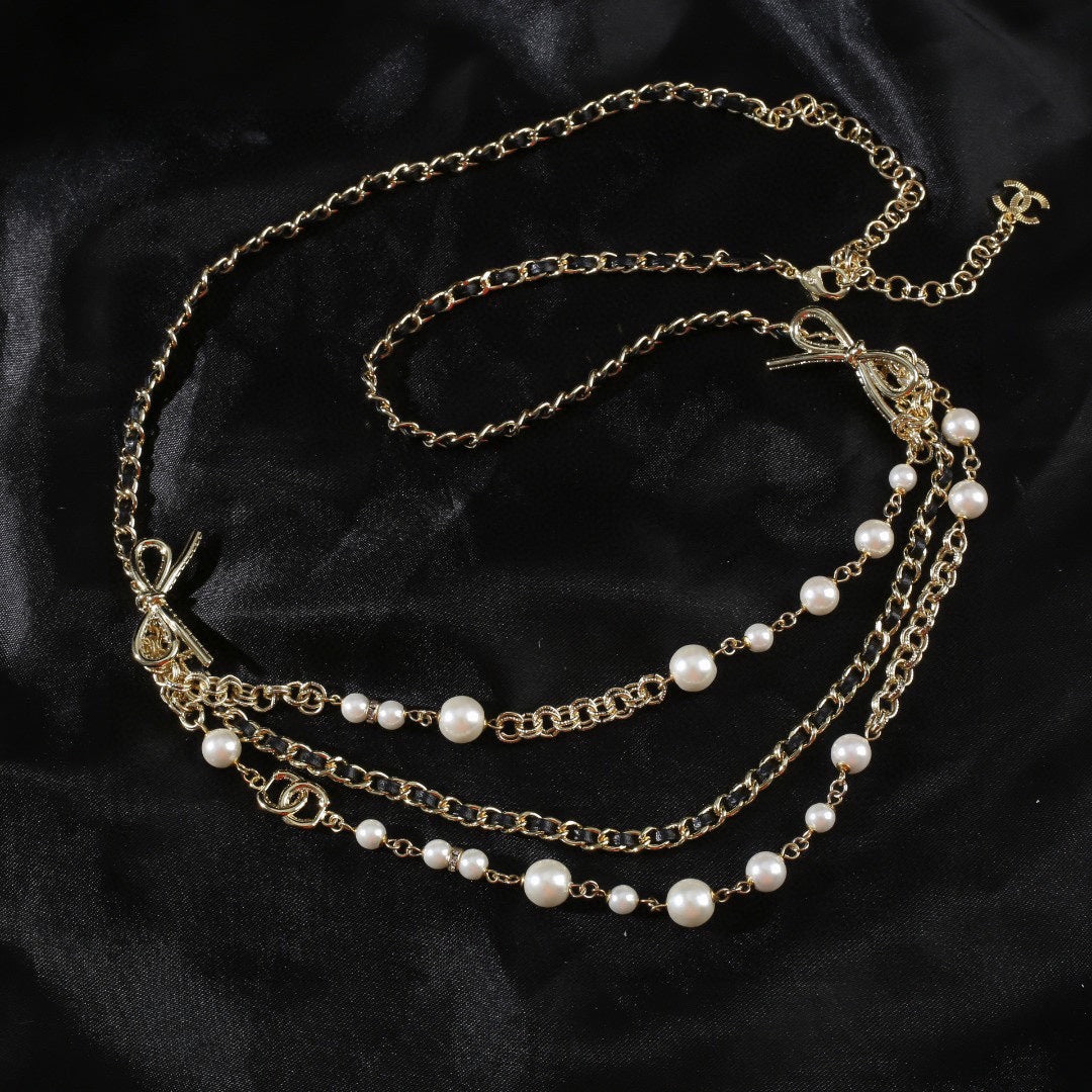 CHANEL 25S GOLD CHAIN BELT WITH PEARL 610440