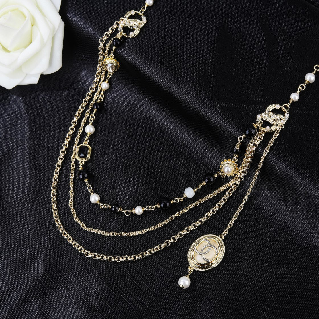 CHANEL 25S CHAIN BELT WITH PEARL 610546